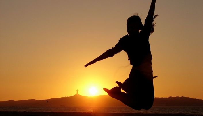 Girl Jumping Sunset